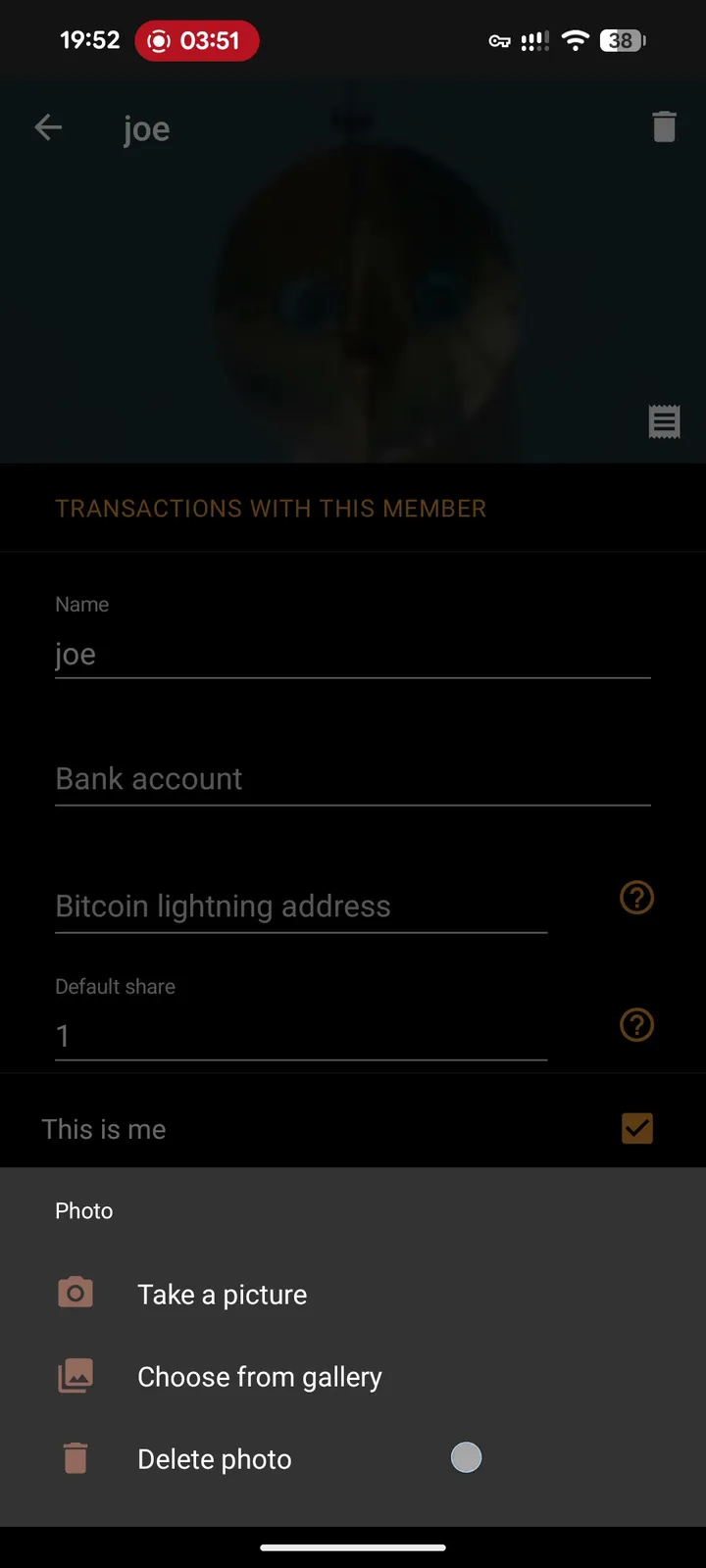 Settle Up's member detail screen from my August 2026 test showing the persistent Default share field, plus bank account and Bitcoin address fields (dummy member named joe)